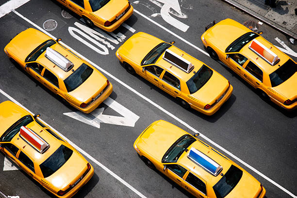 fleet-of-yellow-new-york-city-taxi-cabs-from-above.jpg_s=612x612&w=0&k=20&c=qmN5s8m3GF1NBg1GUYRhI0qFSjHmifCVvVWLjSpR2VE=